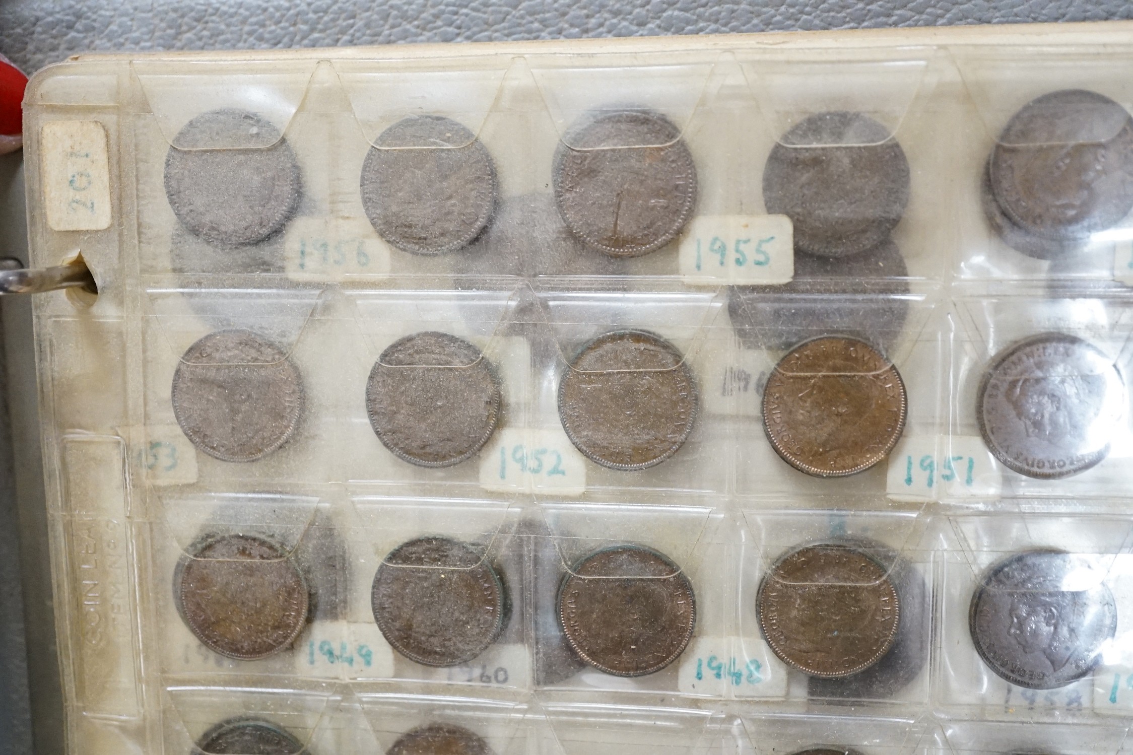 UK and World coins in a case and three albums